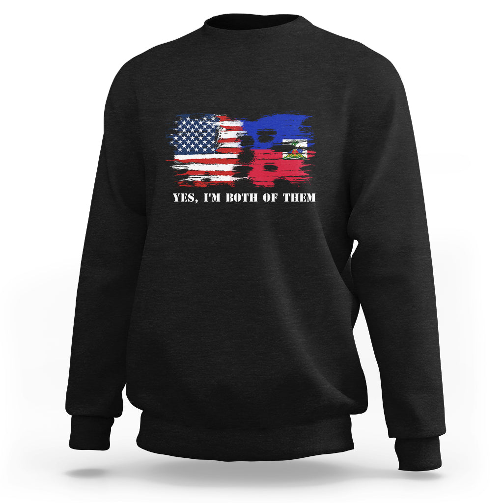 Black crewneck sweatshirt with US-Haiti flag graphic and text 'YES, I'M BOTH OF THEM'.
