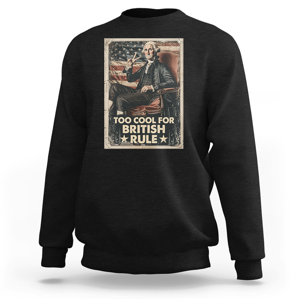 Black crewneck sweatshirt with front graphic reading “TOO COOL FOR BRITISH RULE”.
