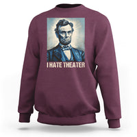 Maroon sweatshirt with Abraham Lincoln portrait graphic and 'I HATE THEATER' text