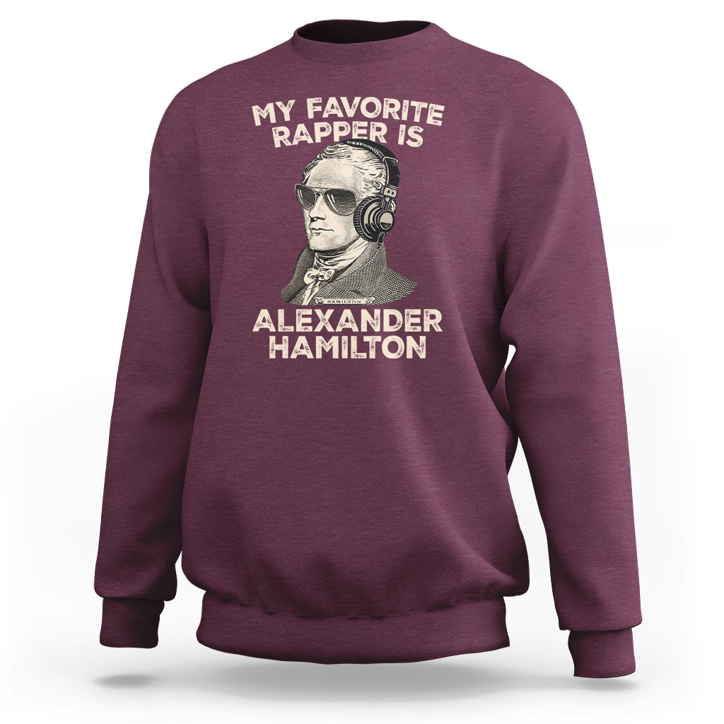 Maroon crewneck sweatshirt with 'My Favorite Rapper Is' Alexander Hamilton front graphic