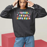 Black teacher sweatshirt with 'Happy To See Your Face' colorful front print