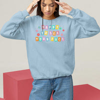 Light blue teacher sweatshirt with 'Happy To See Your Face' colorful front print