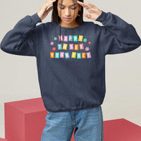 Navy blue teacher sweatshirt with 'Happy To See Your Face' colorful front print