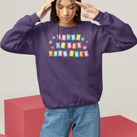 Purple teacher sweatshirt with 'Happy To See Your Face' colorful front print