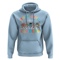 Light blue pullover hoodie with 'Teaching Future Leaders' graphic and front pocket