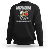 Black kids sweatshirt with crew neck and “punctuation saves lives” graphic