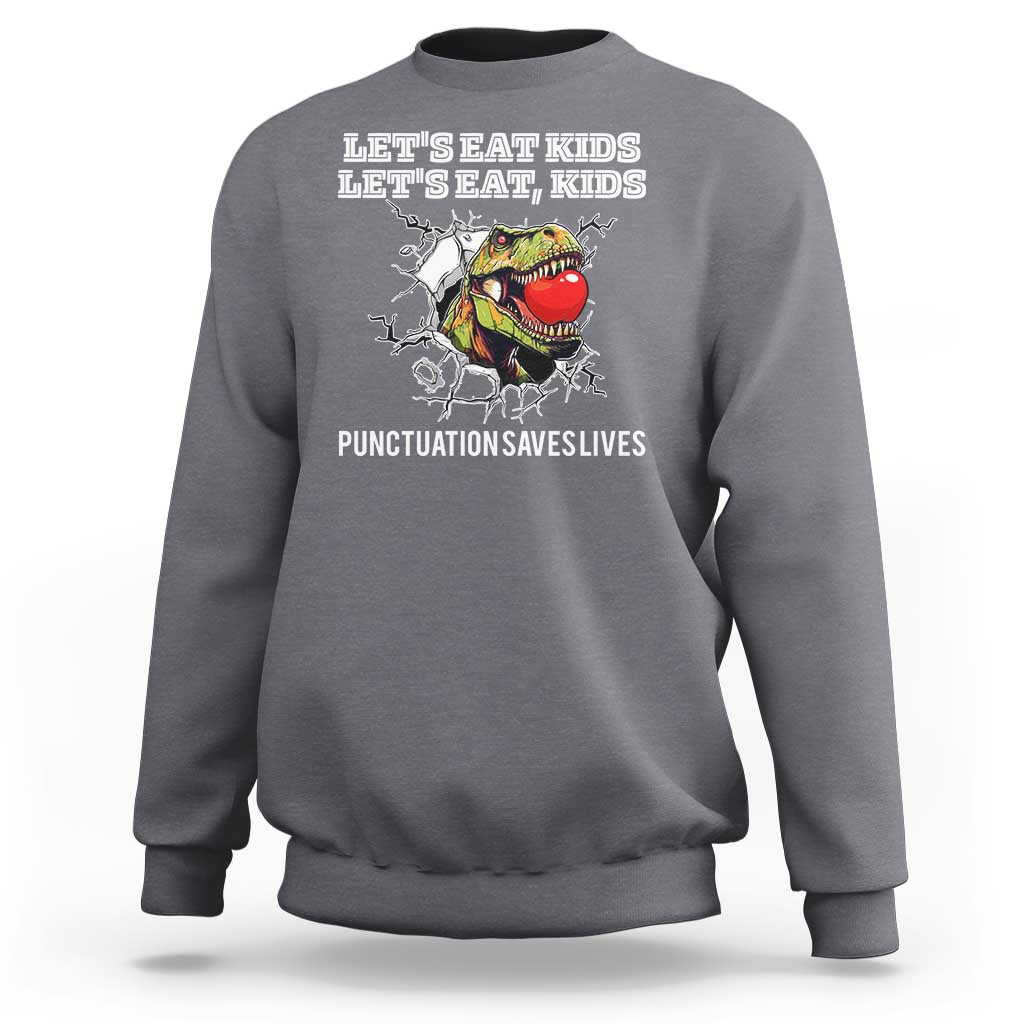 Heather gray kids sweatshirt with crew neck and “punctuation saves lives” graphic