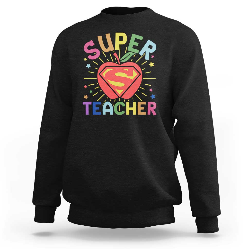 Black sweatshirt with “Super Teacher” superhero heart graphic on the chest
