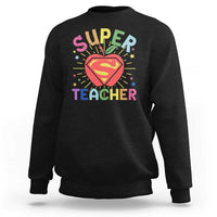 Black sweatshirt with “Super Teacher” superhero heart graphic on the chest