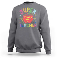 Medium gray sweatshirt with “Super Teacher” superhero heart graphic on the chest