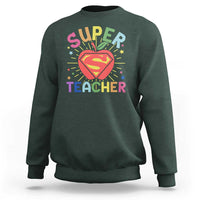 Dark forest green sweatshirt with “Super Teacher” superhero heart graphic on the chest