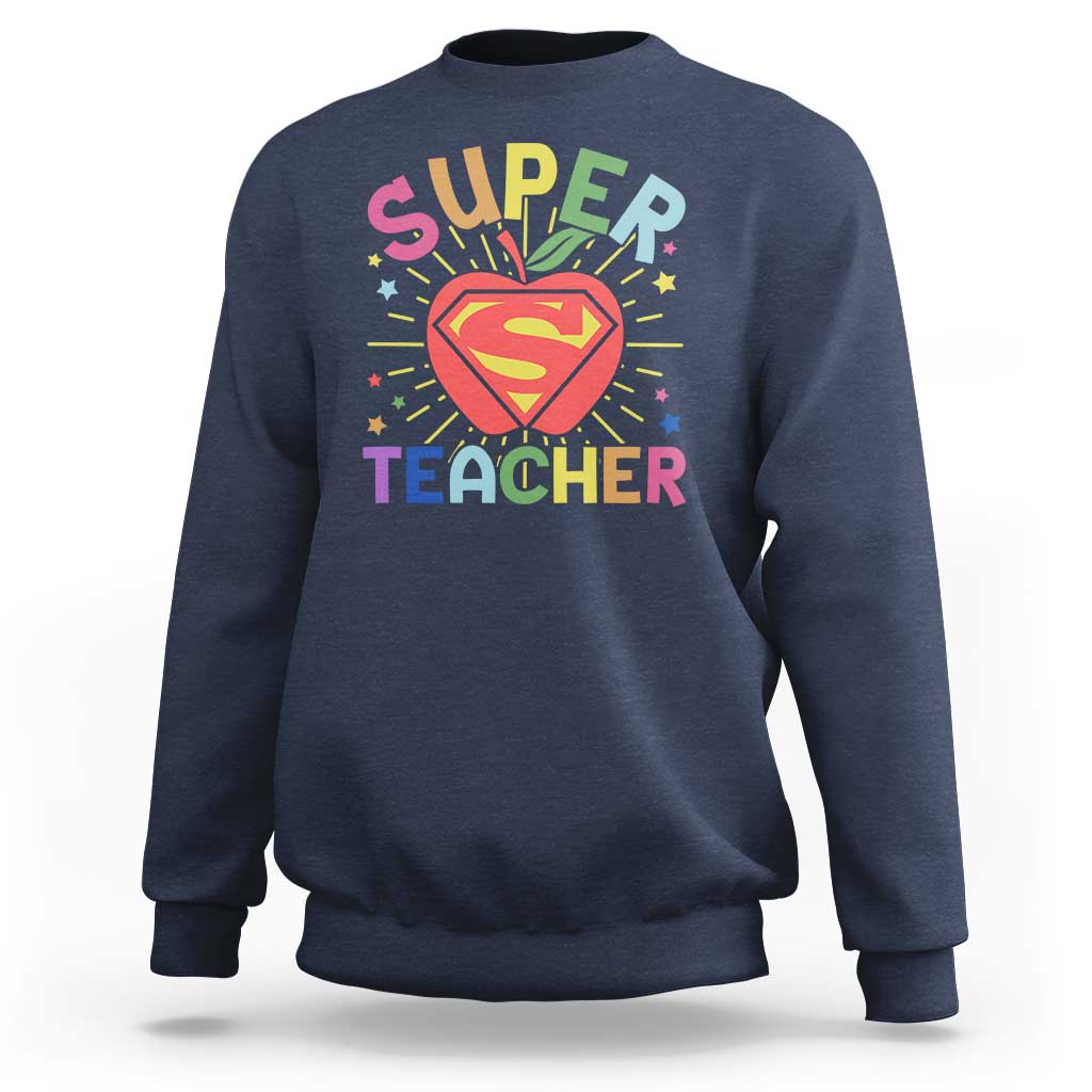 Navy sweatshirt with “Super Teacher” superhero heart graphic on the chest