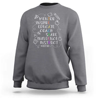 Heather gray crewneck sweatshirt with white mentor-themed quote graphic on front