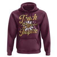 Maroon teacher hoodie with “Teach Love Inspire” front graphic and front pocket