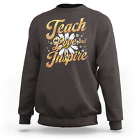 Dark chocolate brown teacher sweatshirt with "Teach Love and Inspire" front graphic