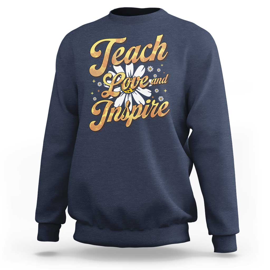 Navy teacher sweatshirt with "Teach Love and Inspire" front graphic, crew neck