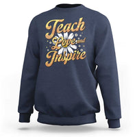 Navy teacher sweatshirt with "Teach Love and Inspire" front graphic, crew neck