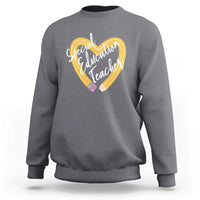 Gray sweatshirt with front heart graphic reading “Special Education Teacher”