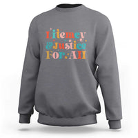 Sport gray crewneck sweatshirt with “Literacy & Justice For All” front graphic