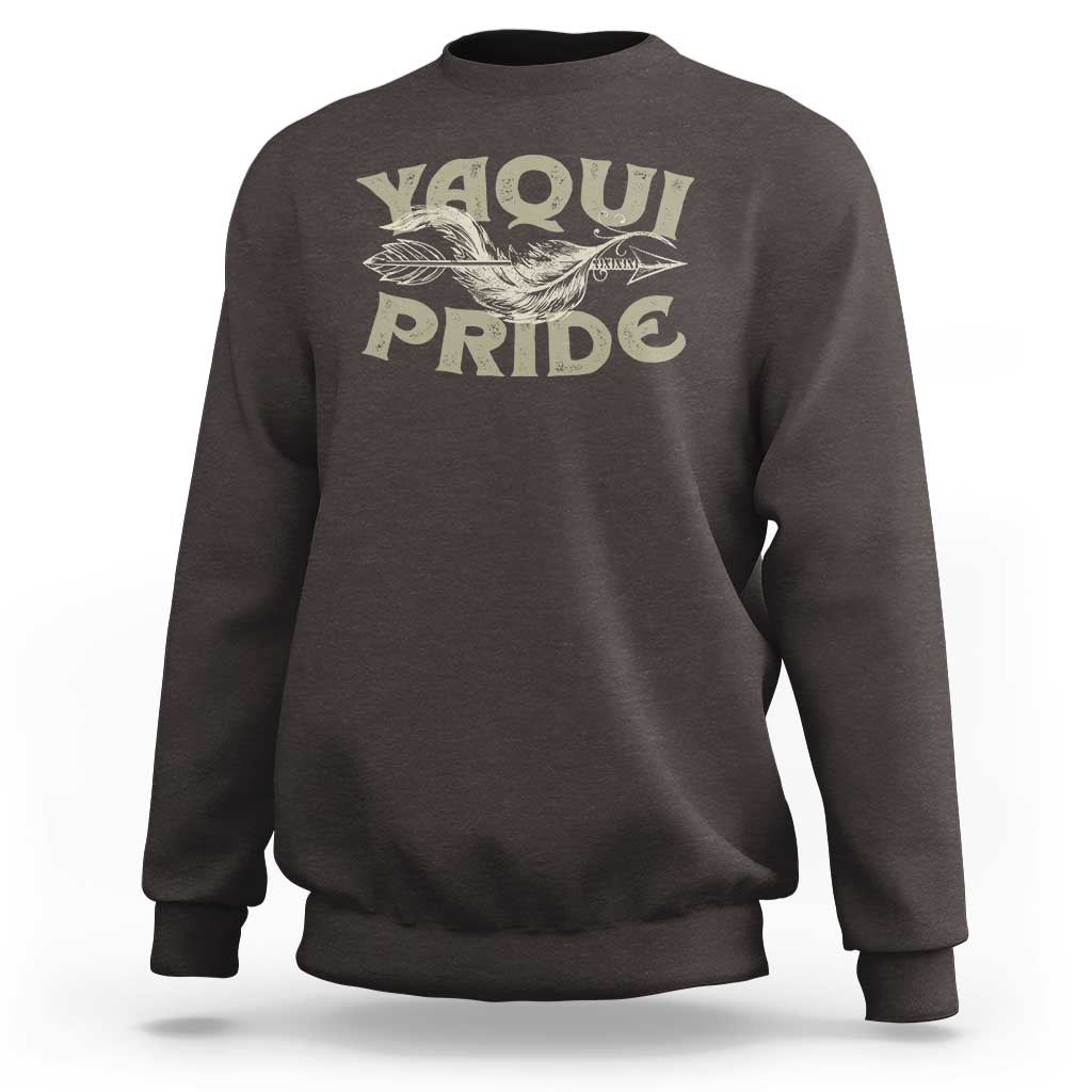 Charcoal crewneck sweatshirt with Yaqui Pride bird graphic on front