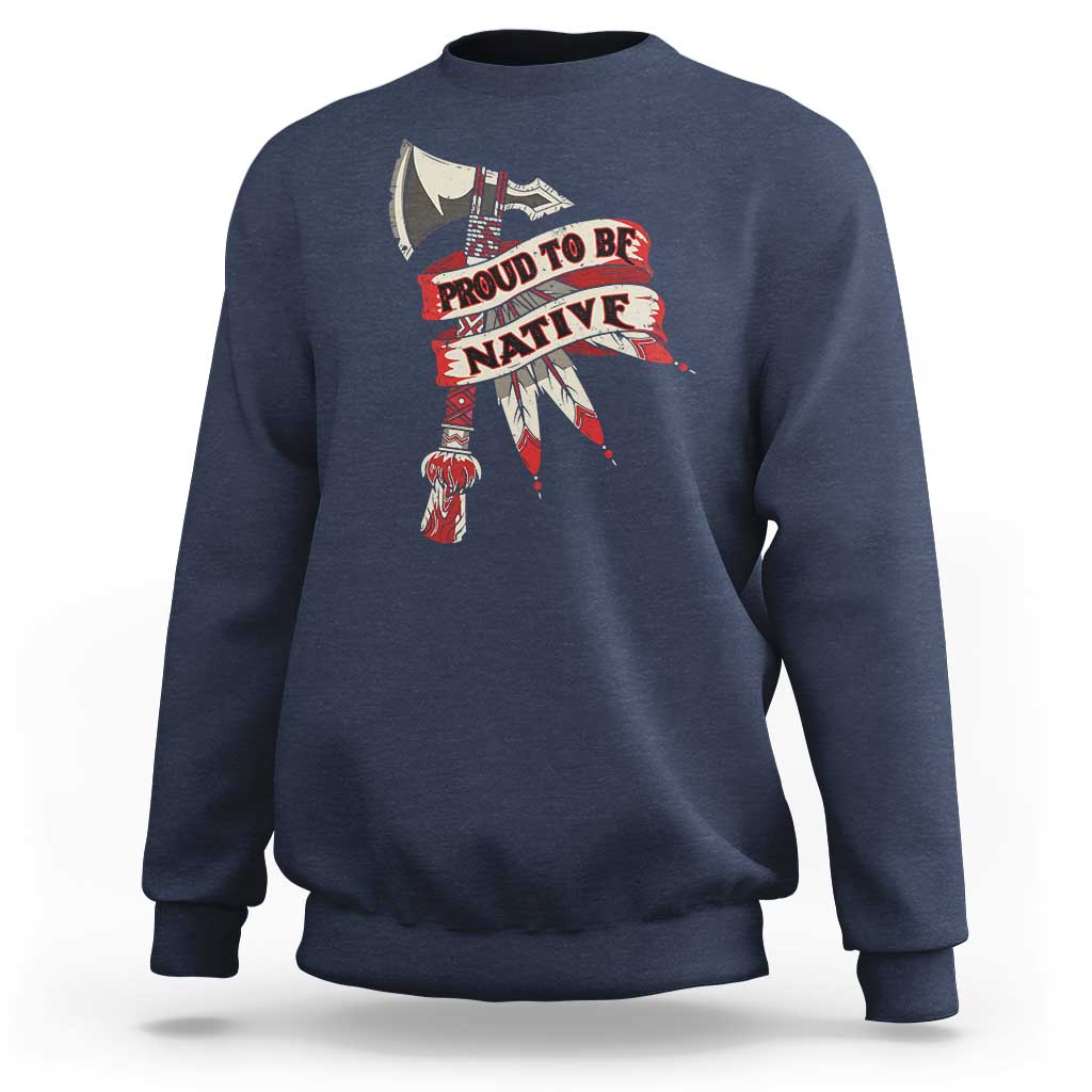 Navy crewneck sweatshirt with “PROUD TO BE NATIVE” graphic on chest