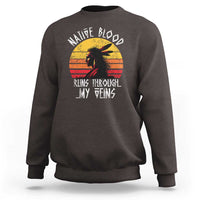 Charcoal gray crewneck sweatshirt with long sleeves and Native graphic on chest.