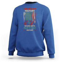 Blue crewneck sweatshirt with Native-themed American flag graphic on front