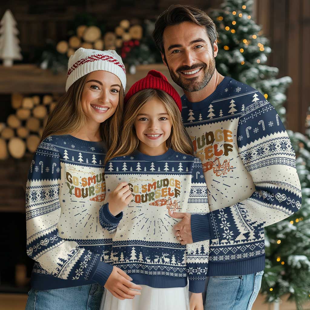 Navy and cream ugly Christmas sweater with 'Go Smudge Yourself' print and winter tree pattern.