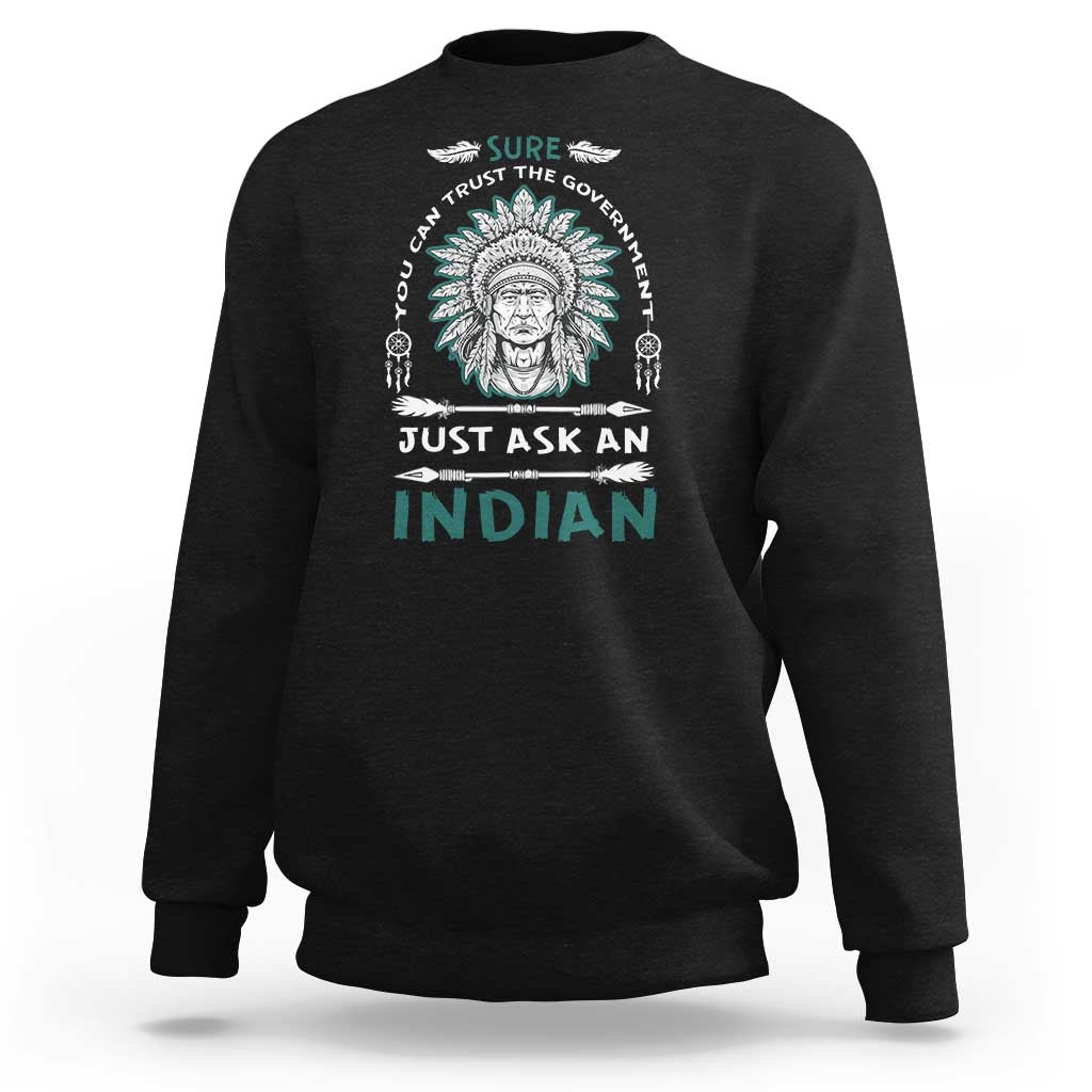 Black crewneck sweatshirt with Native American head graphic and slogan print on chest