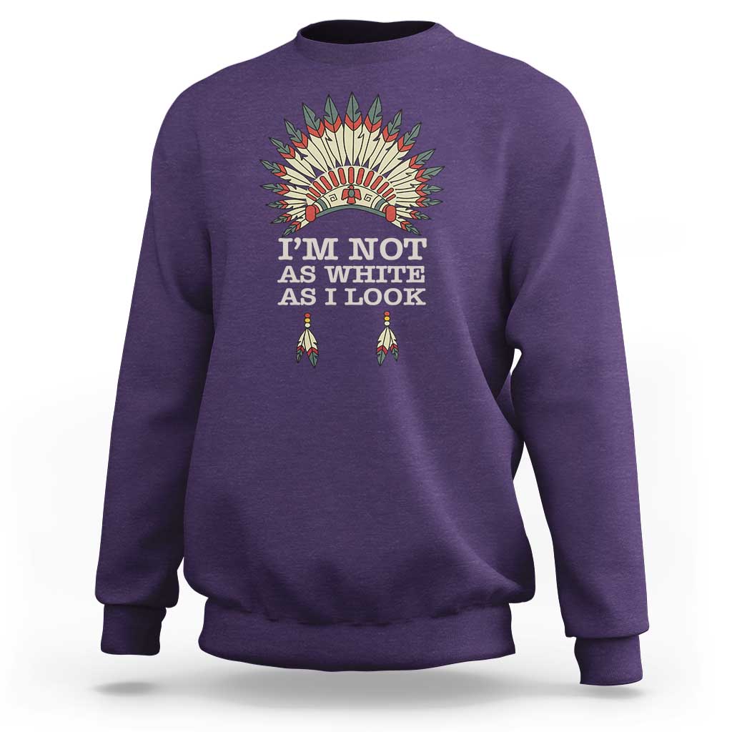 Purple crewneck sweatshirt with colorful Native-inspired back graphic and text