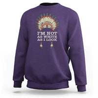 Purple crewneck sweatshirt with colorful Native-inspired back graphic and text