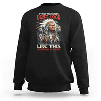 Black crewneck sweatshirt with Native-inspired portrait graphic and red/white front text