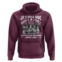 Maroon pullover hoodie with front graphic, hood with drawstrings, and kangaroo pocket