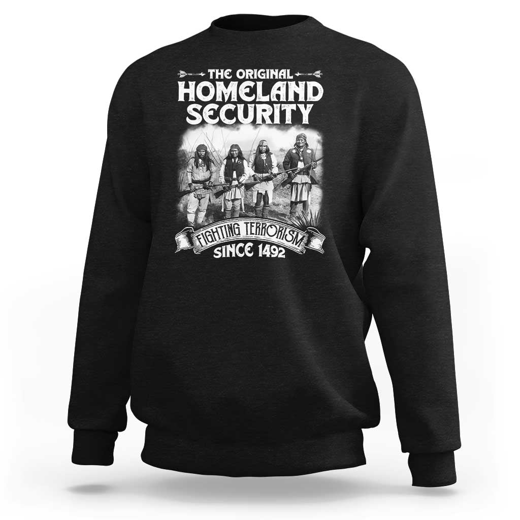 Black crewneck sweatshirt with front Native-style graphic and bold Homeland Security text