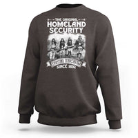 Charcoal crewneck sweatshirt with front Native-style graphic and Homeland Security lettering