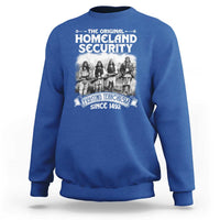 Royal blue crewneck sweatshirt with front Native-style graphic and Homeland Security text