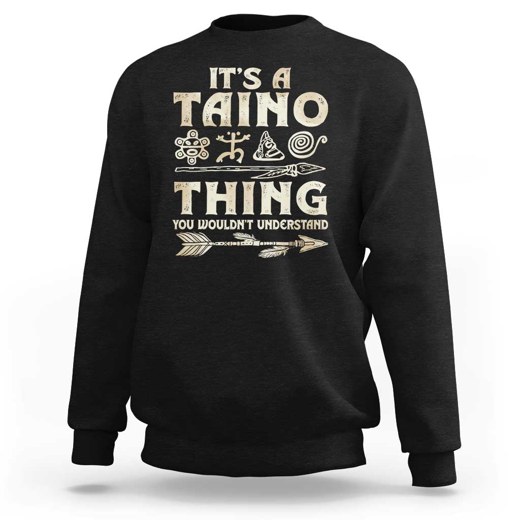 Black crewneck sweatshirt with Taino graphic text on front