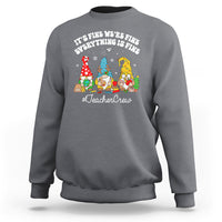 Heather gray crewneck sweatshirt with holiday gnome TeacherCrew graphic.