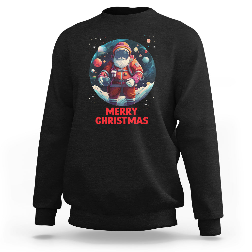 Black Christmas sweatshirt with astronaut Santa graphic and “Merry Christmas” text