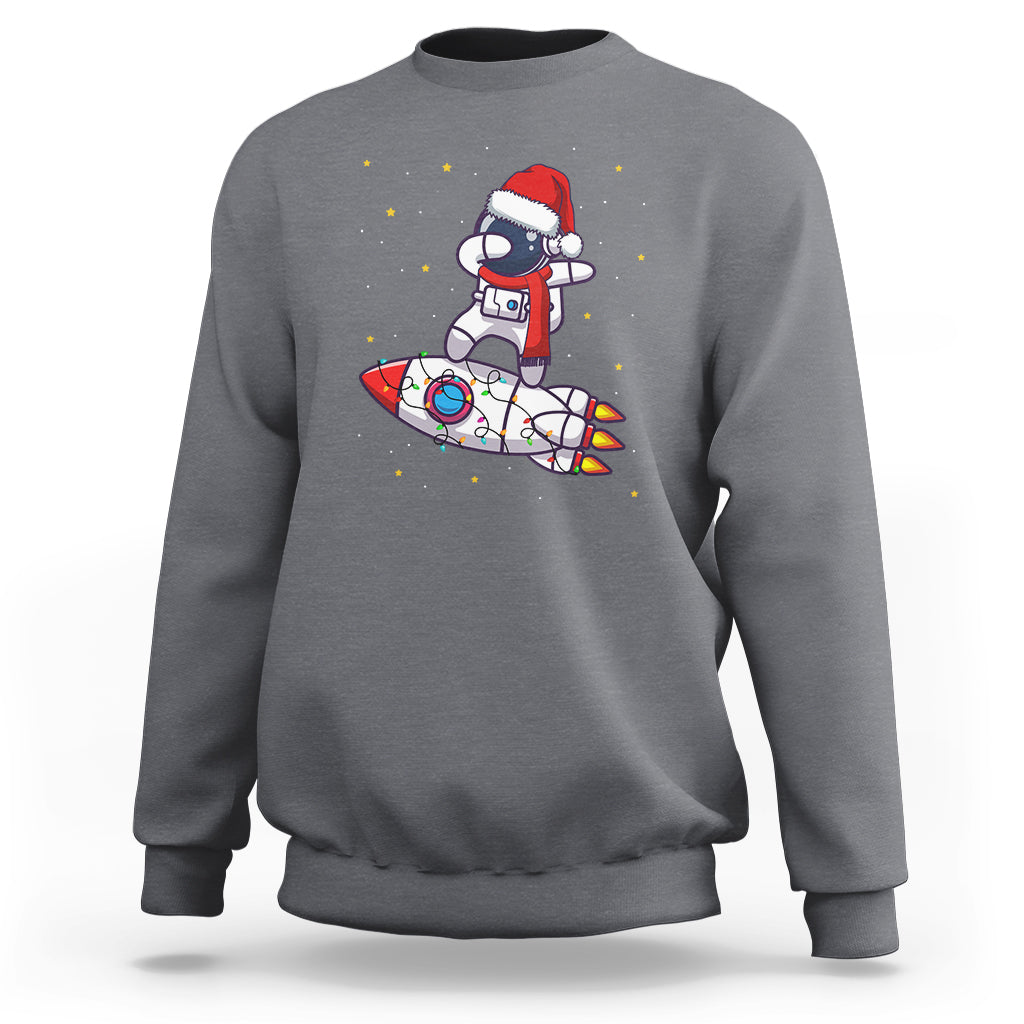 Men's charcoal Christmas astronaut sweatshirt with Santa riding a rocket graphic front.