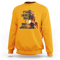 Gold crew-neck sweatshirt with large anime graphic on front center