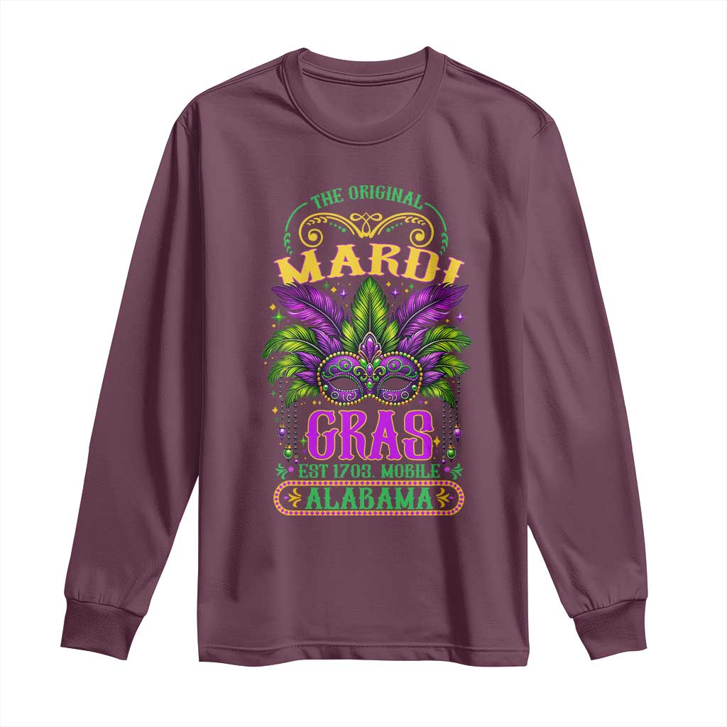 Maroon long-sleeve shirt with colorful Mardi Gras graphic and floral ornament logo