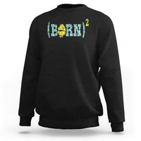 Black sweatshirt with colorful blue-and-yellow graphic print on the chest