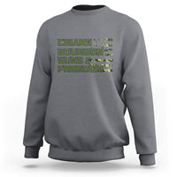Charcoal crewneck sweatshirt with stacked pixel-style text graphic on the chest.