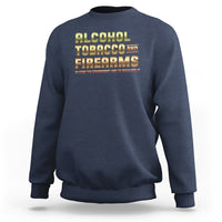Navy crewneck sweatshirt with Alcohol Tobacco Firearms front graphic.