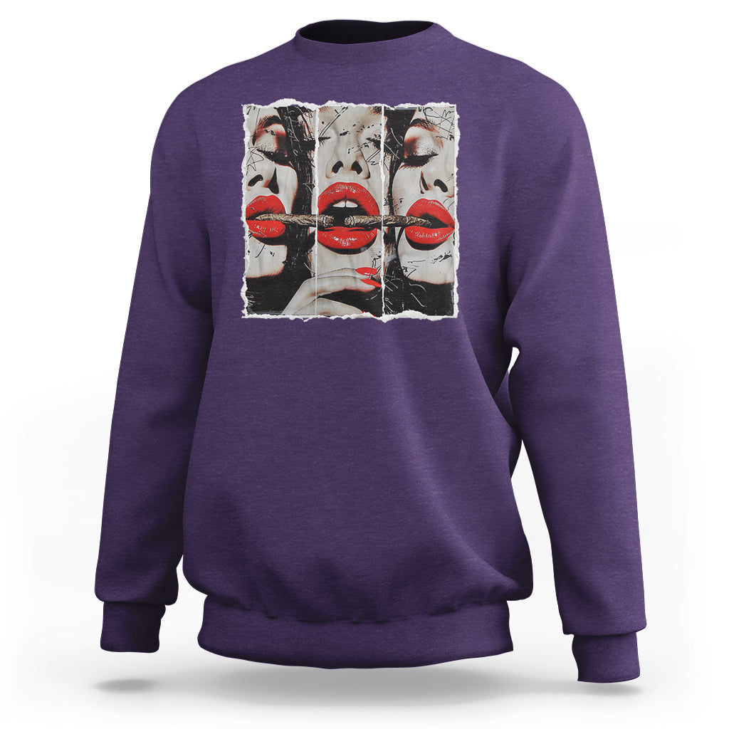 Purple crewneck sweatshirt with front graphic of stylized faces and red lips