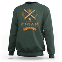 Dark green crewneck sweatshirt with front graphic of crossed cigars and crown