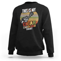 Black sweatshirt with front graphic showing a cigar and “Cigar Smoking”