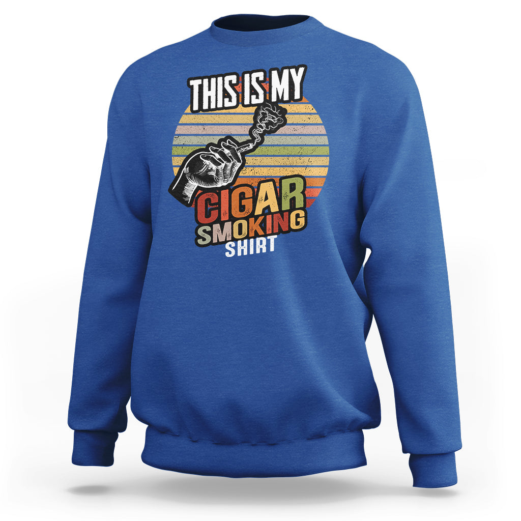 Royal blue sweatshirt with front graphic: “This Is My Cigar Smoking”