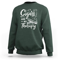 Dark green sweatshirt with white cigar slogan graphic on chest